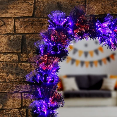 National Tree Company 9 Ft. Black Fiber Optic Garland With Purple And Orange Lights 1 National Tree Company 9 Ft. Black Fiber Optic Garland With Purple And Orange Lights